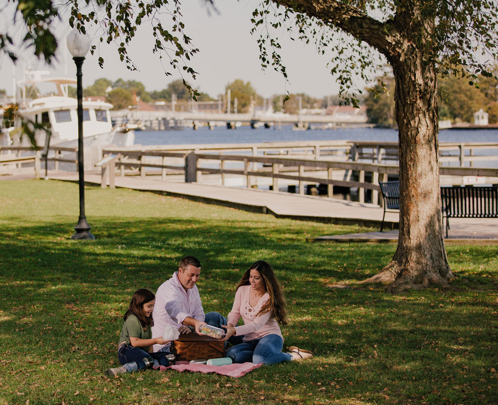 family enjoying picnic at waterfront park, Elizabeth City NC